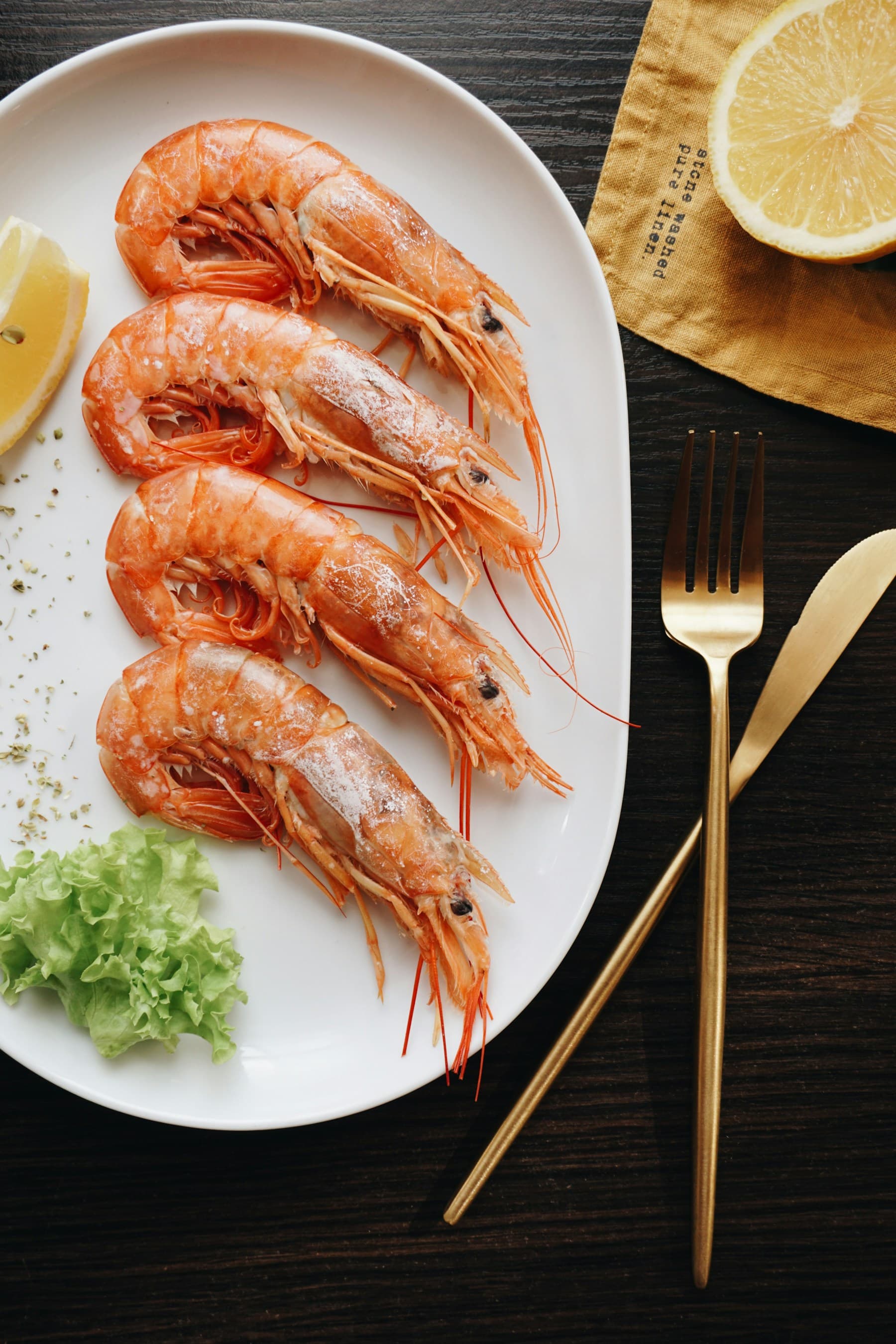 Prawns served on a white plate